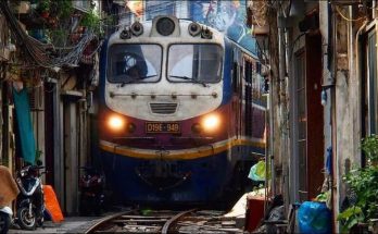 Seeing a train in the narrow streets of Hanoi