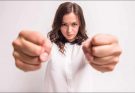 Women's Fists: Clenched fingers and character