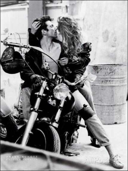 Kissing on Harley Davidson Motorcycle